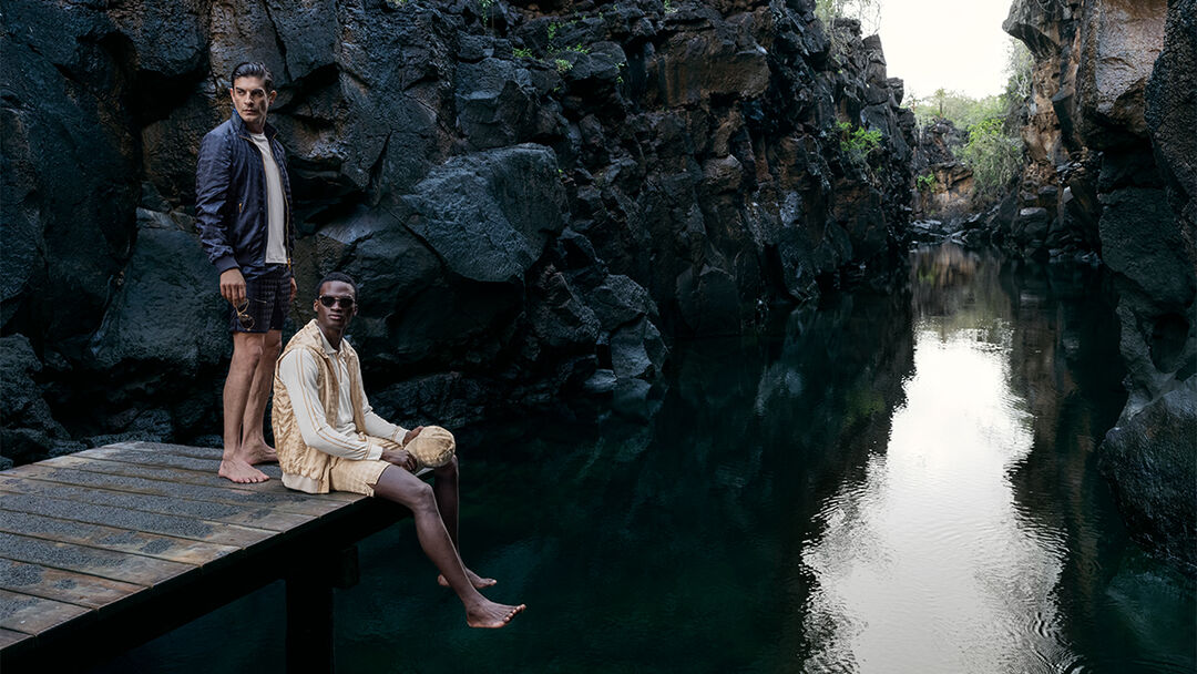 2 models at a hidden beach in Galapagos