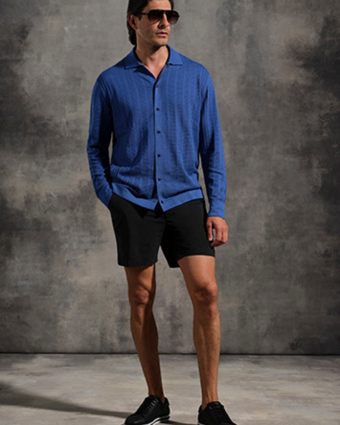 The model wearing SR swim trunks