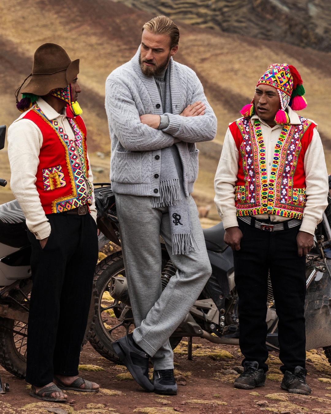 The photo features a Stefano Ricci knit cashmere cardigan with premium Orylag fur lining.