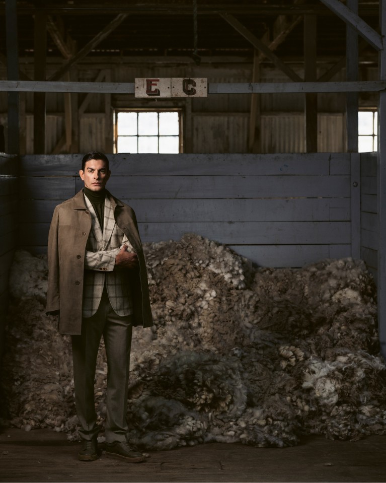 Tao is wearing a clean-cut coat in nubuck lambskin leather over a wool and cashmere two-button jacket.