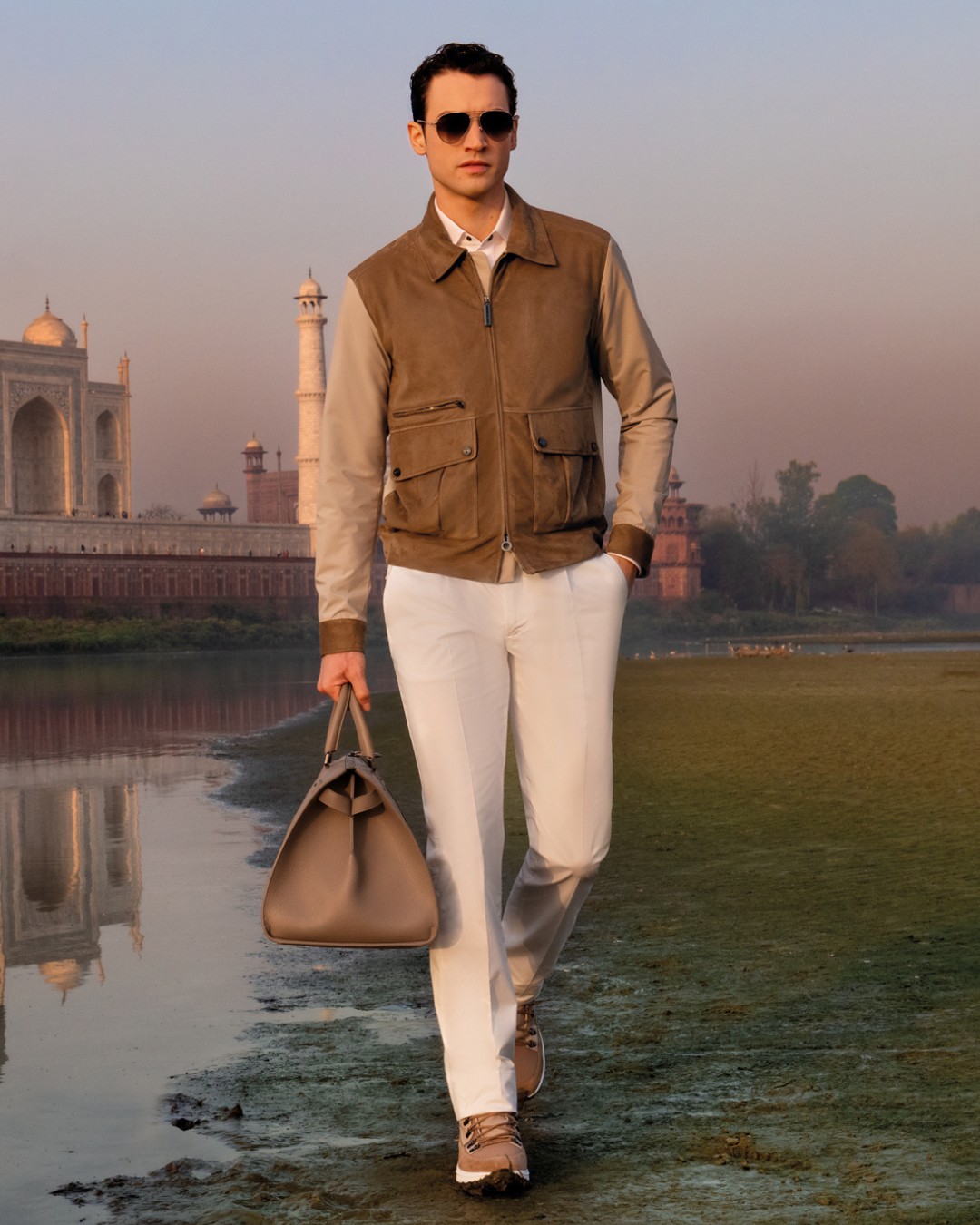 Model walking by banks of the sacred Yamuna River