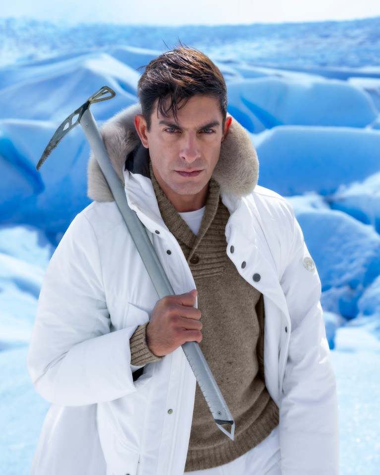 Tao is wearing the SR Explorer hooded down jacket crafted from luxury technical fabric and featuring a fox fur trim at the hood &mdash; one of the season&rsquo;s iconic Explorer pieces.