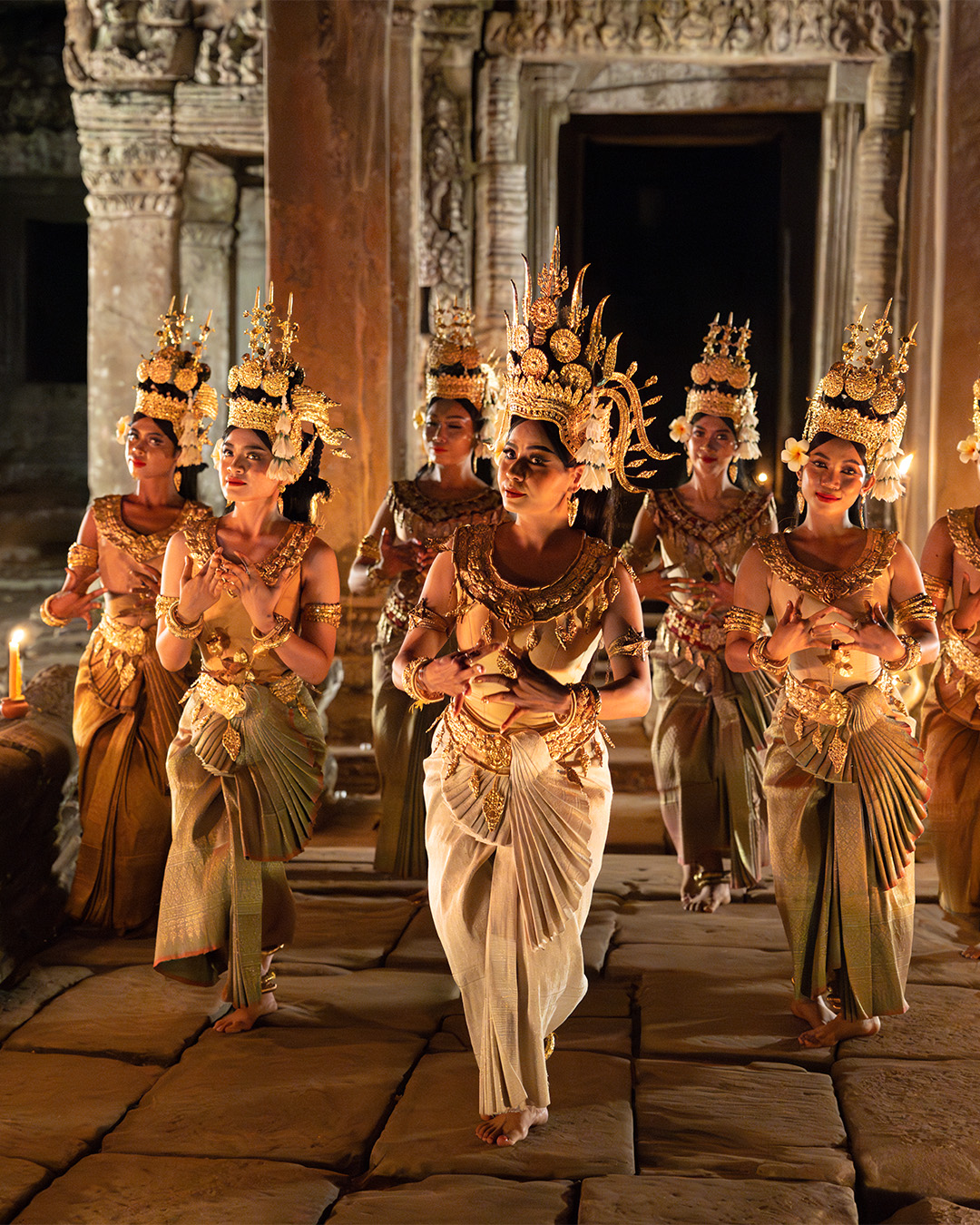 Preah Khan Temple. Robam-Tep Apsara, one of the national symbols of Cambodia. Apsara represent an important motif in the stone bas-relief of the Angkorian temple. They wear a Sampot Sarabap, a type of silk brocade that is intricately pleated in the front.