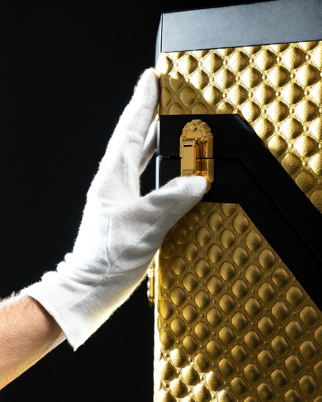 The artisan working on the Trophy Case