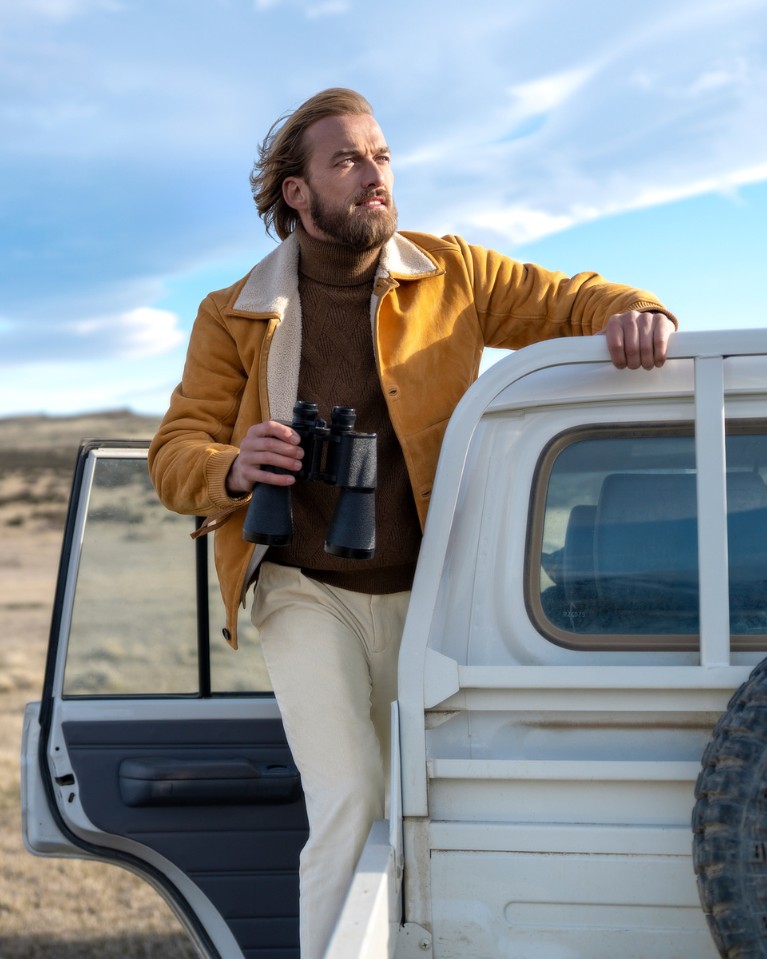 Lukas is wearing the Stefano Ricci Lacon shearling blouson paired with a cashmere turtleneck underneath